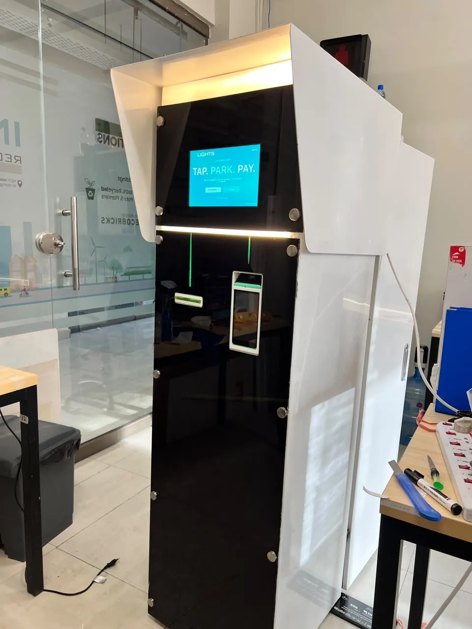InLights parking kiosk prototype with TAP. PARK. PAY. interface