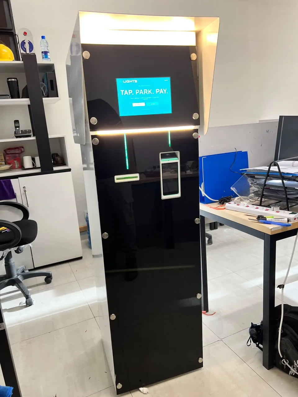 Zindigi-branded parking kiosk outdoors at night